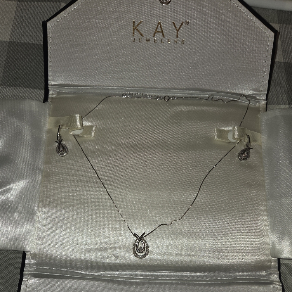 Kay Jewelers Love Embrace Silver Necklace and Earring Set With Diamonds.
